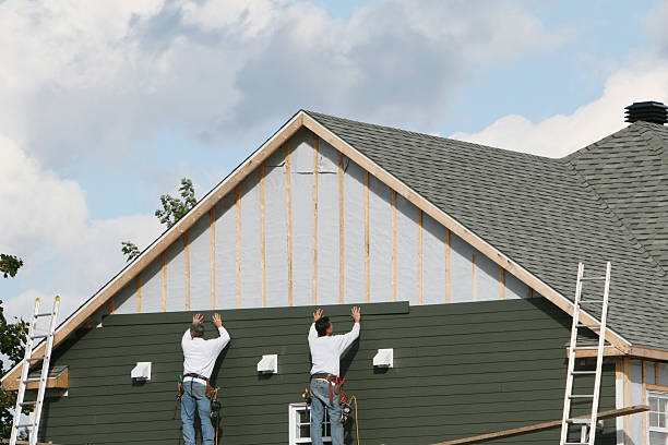 Professional Siding Installation technician working in Chincoteague Island, VA
